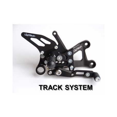 Gruppo pedane complete regolabili Lightech In Ergal nere per Aprilia RSV4, poggiapiede fisso