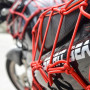 Rete elastica ragno per moto rosso